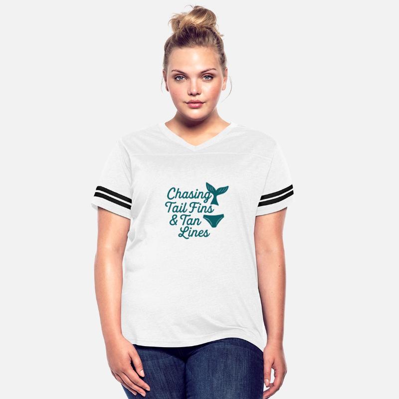 Chasing Tail Fins and Tan Lines.